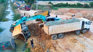 APPARENTLY POWERFUL RECOVERY DUMP TRUCK 25TON FAIL ON ROAD WITH EXCAVATOR & DUMP TRUCK 25T CLING UP